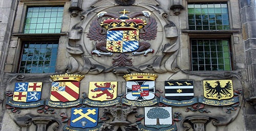 heraldic shields on gemeenlandshuis beautiful delft facades