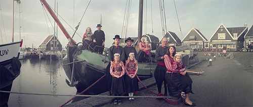 a family in traditional marken costumes