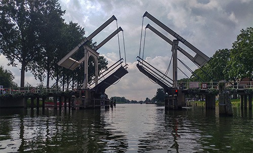 opened draw bridge at vecht river in Weesp